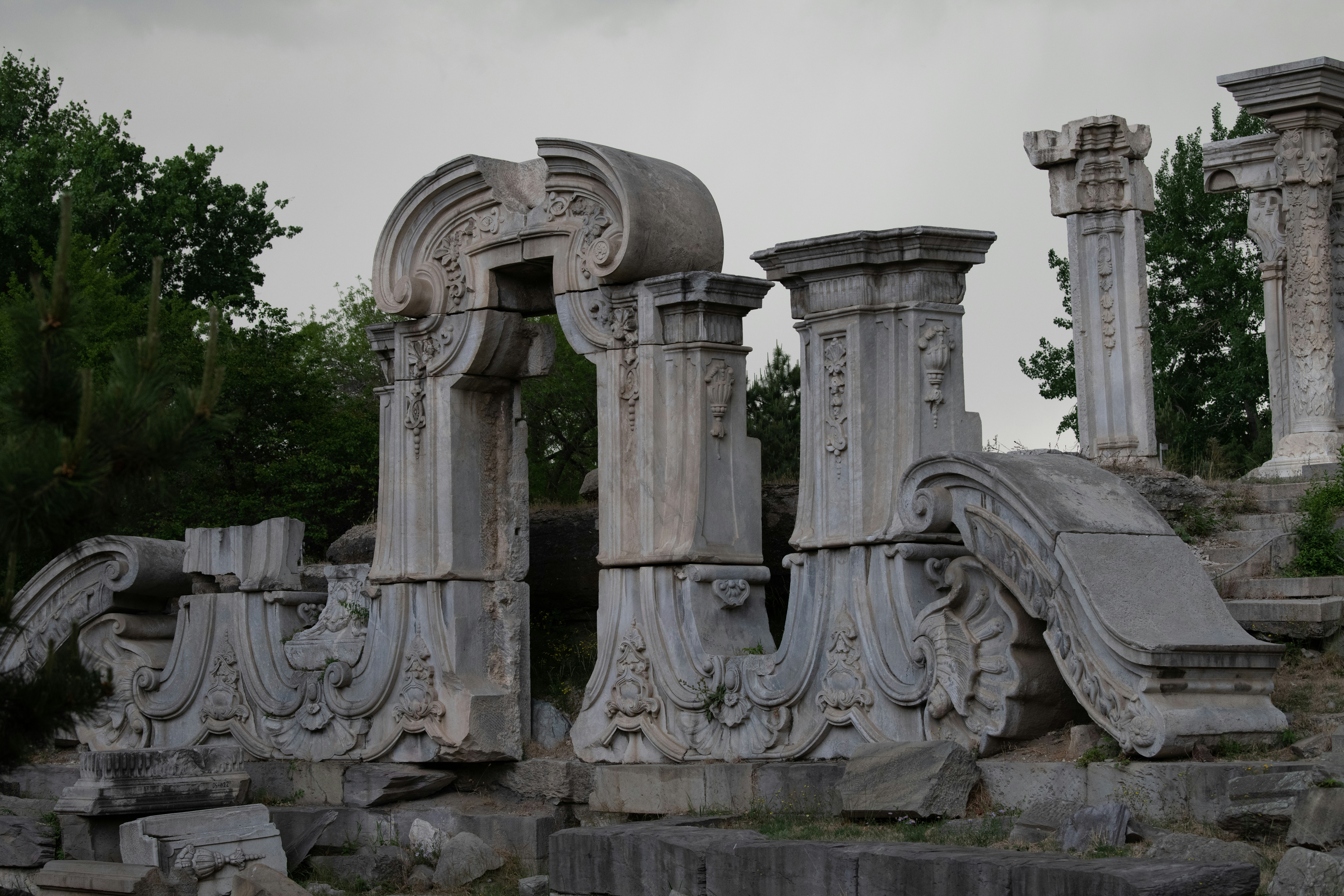 a group of stone pillars sitting next to each other