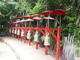 A set of metal chimes hanging gently, ready to release soothing tones.