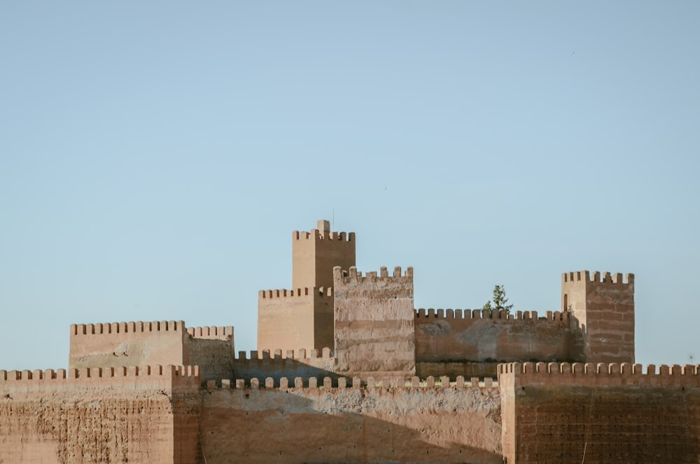 a castle with a clock tower on top of it