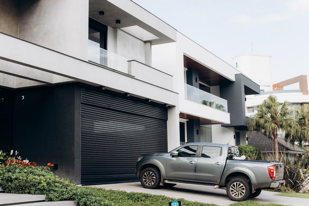 a truck is parked in front of a building