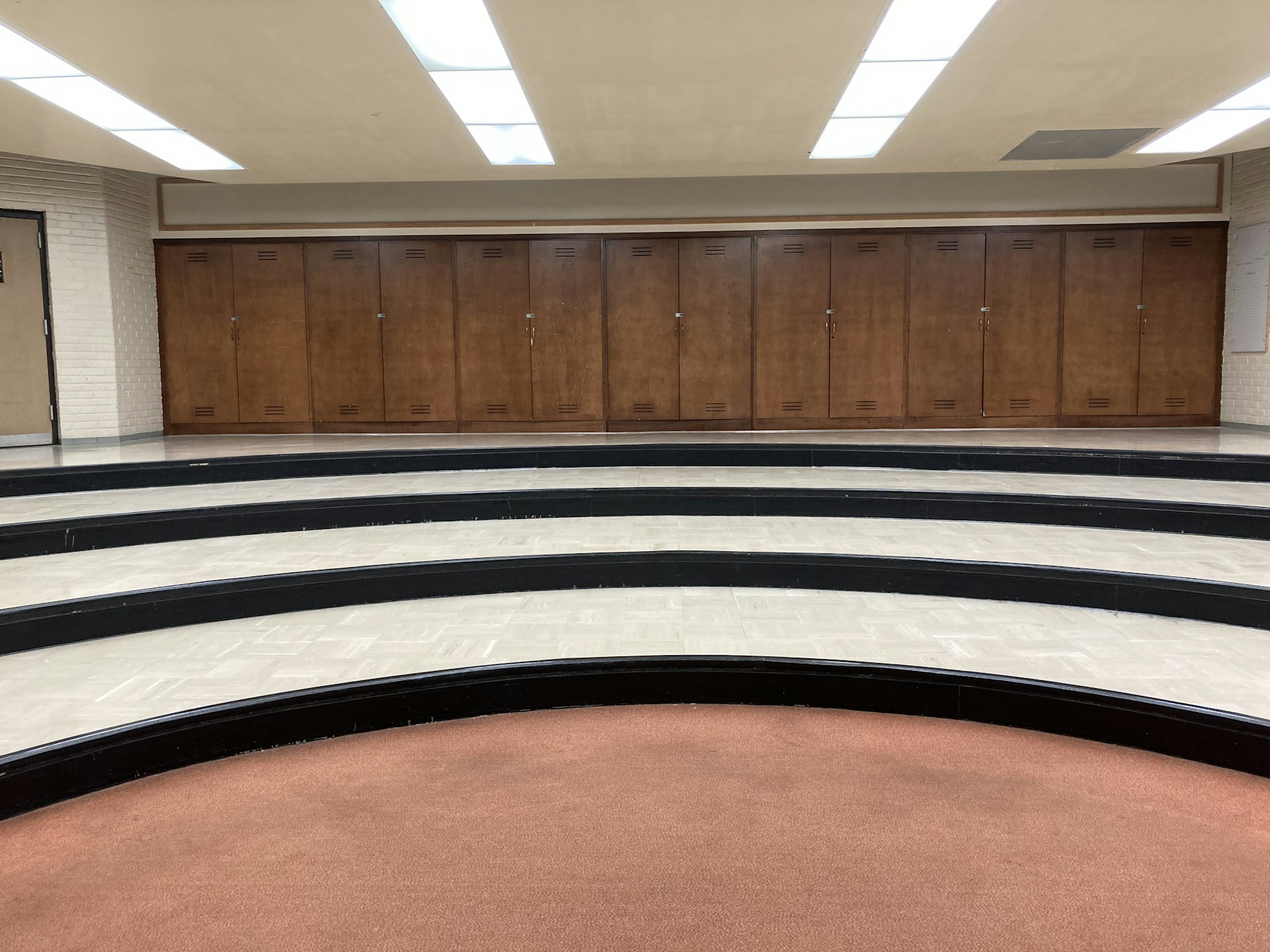 woman wearing yellow long-sleeved dress under white clouds and blue sky during daytime