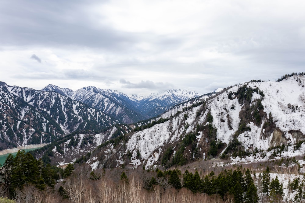 a view of a mountain range covered in snow