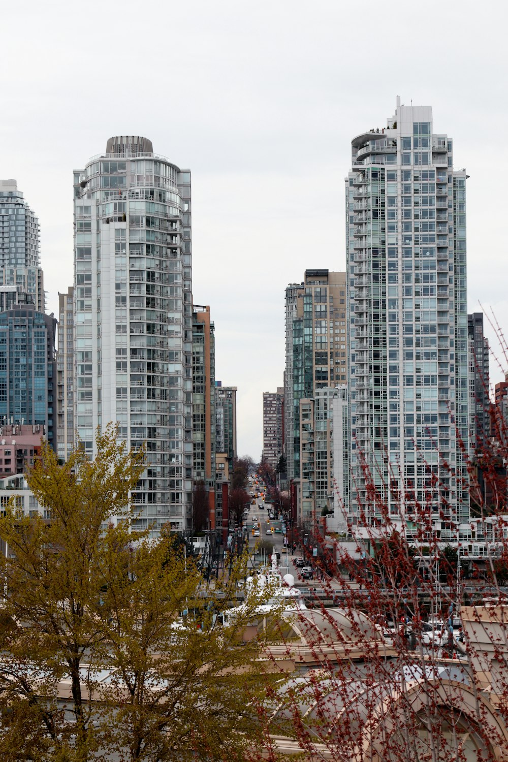 a view of a city with tall buildings in the background