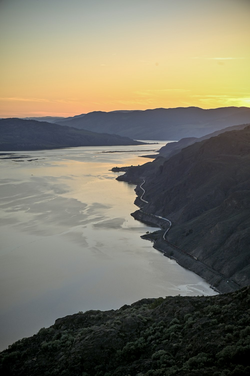 a large body of water surrounded by mountains