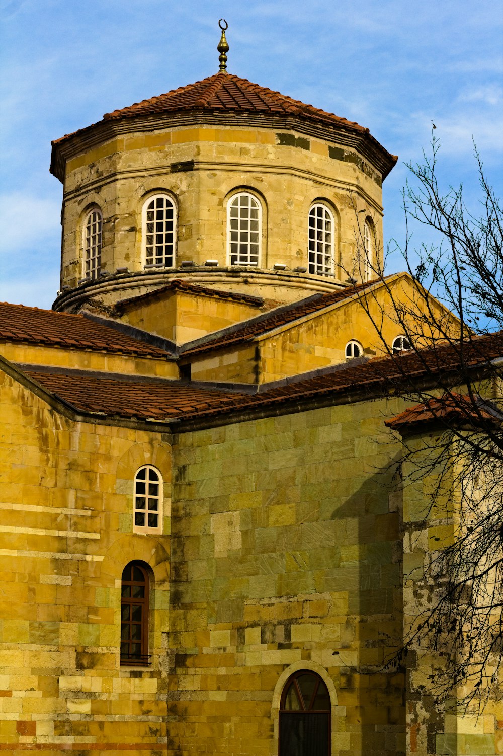 a large building with a clock on the top of it