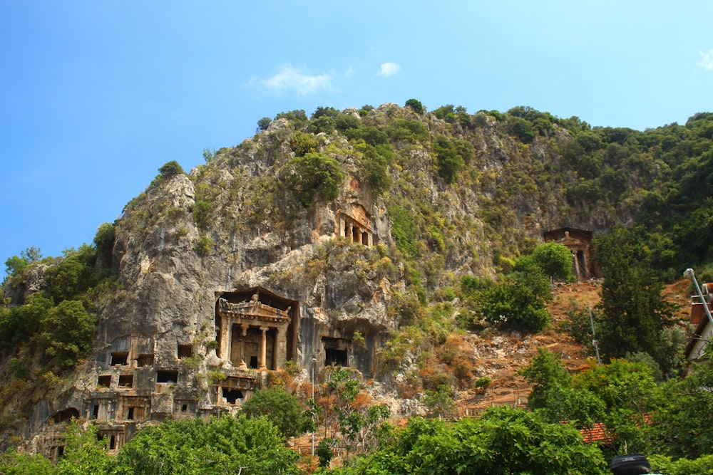 a mountain with a bunch of buildings on top of it