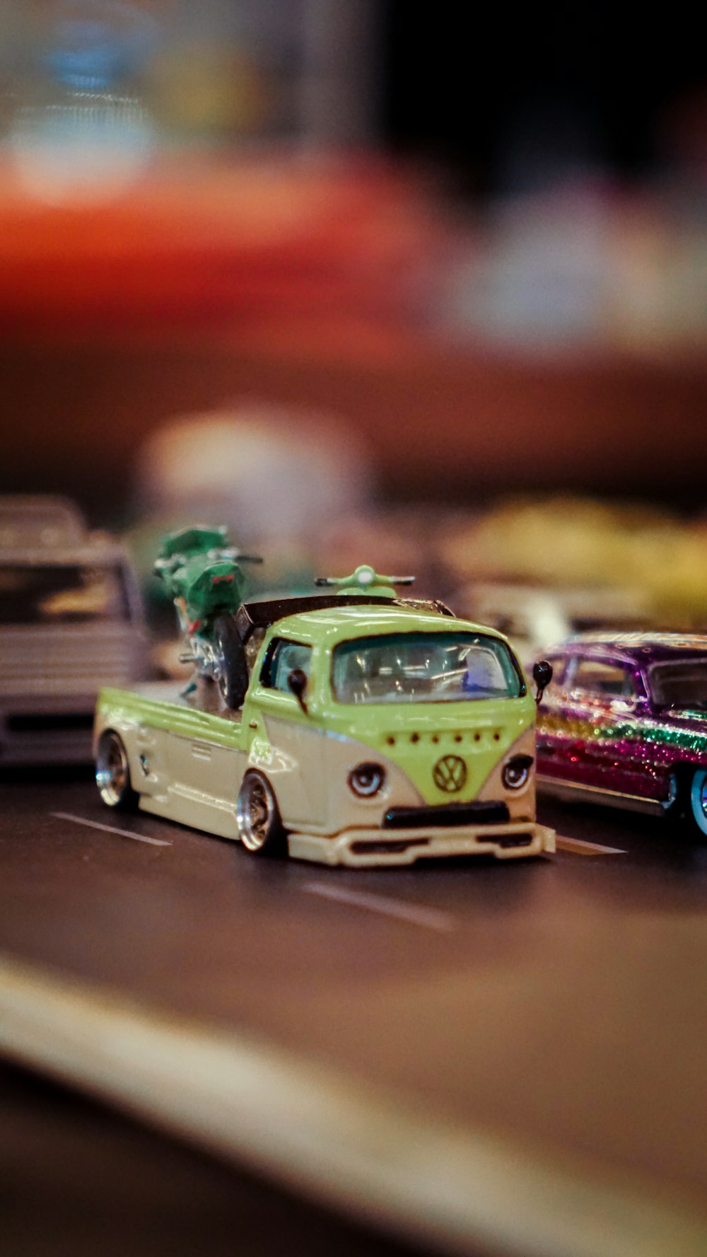 a group of toy cars sitting on top of a table