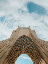 a very tall building with a sky in the background