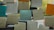 Close-up of handwritten positive reviews on colorful sticky notes.