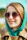 a woman wearing sunglasses and a green scarf