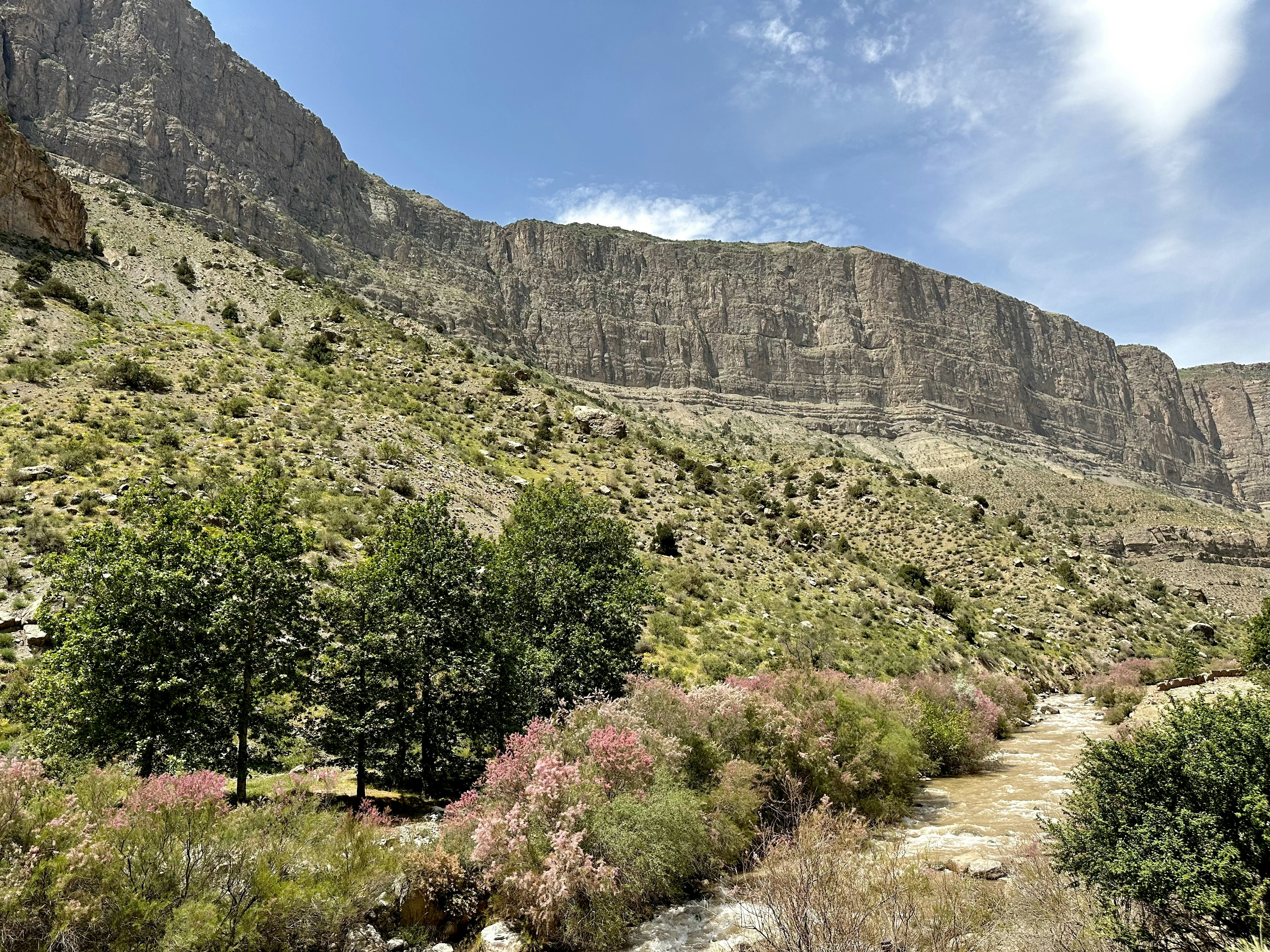 a mountain with a river running through it