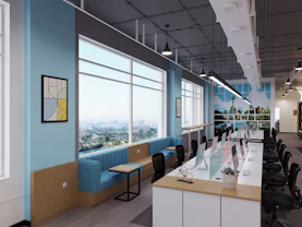Bright, modern London office with gleaming desks and tidy floors.