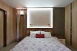 An inviting bedroom space with warm lighting and furnishings.