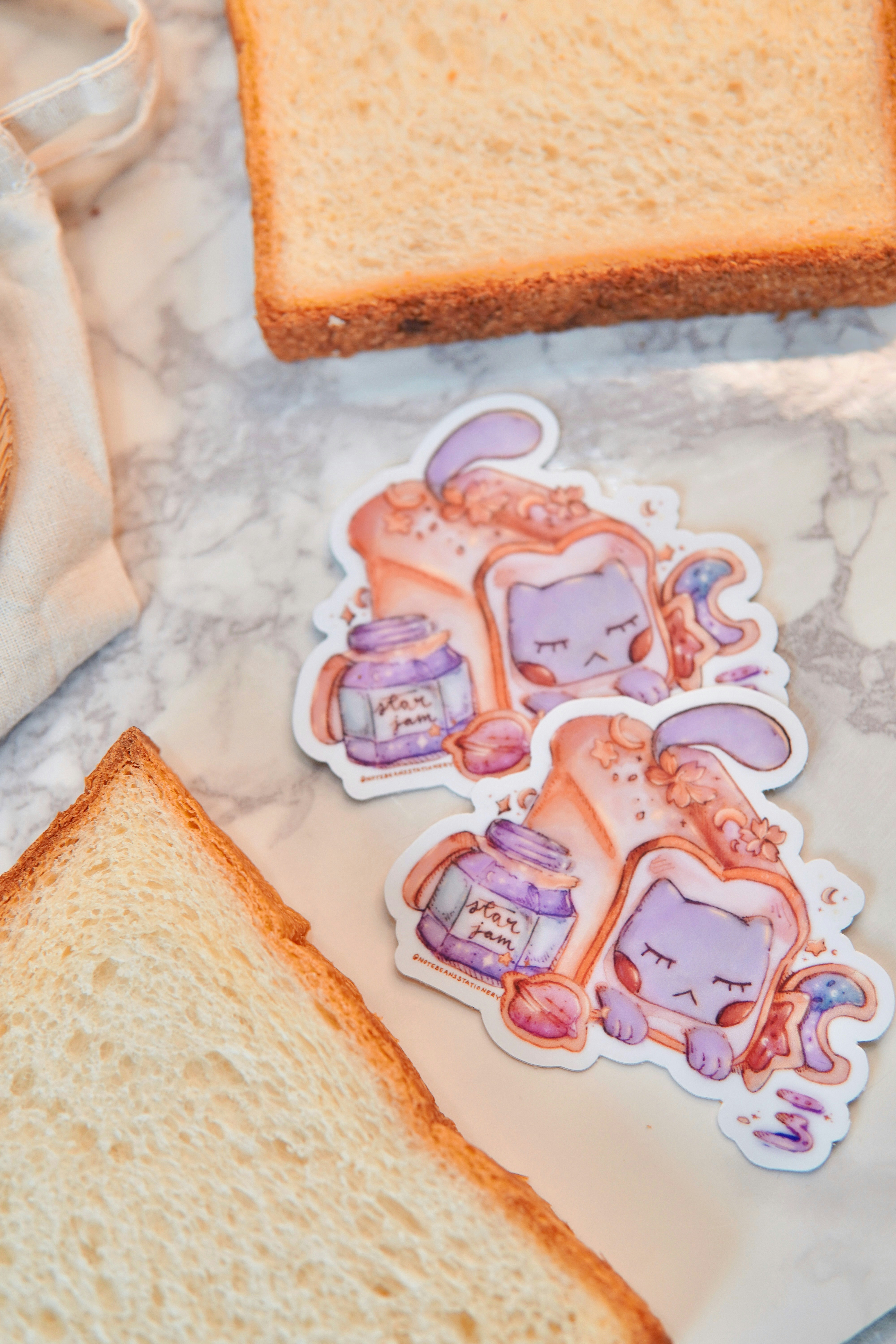 A close up of a piece of bread with stickers on it photo – Free Food ...