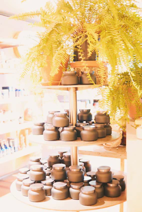 A clean and elegant Moroccan-inspired natural supplement display with dark green and gold accents.