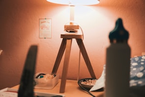 A cozy setting featuring bitz420 items on a wooden table with soft lighting.