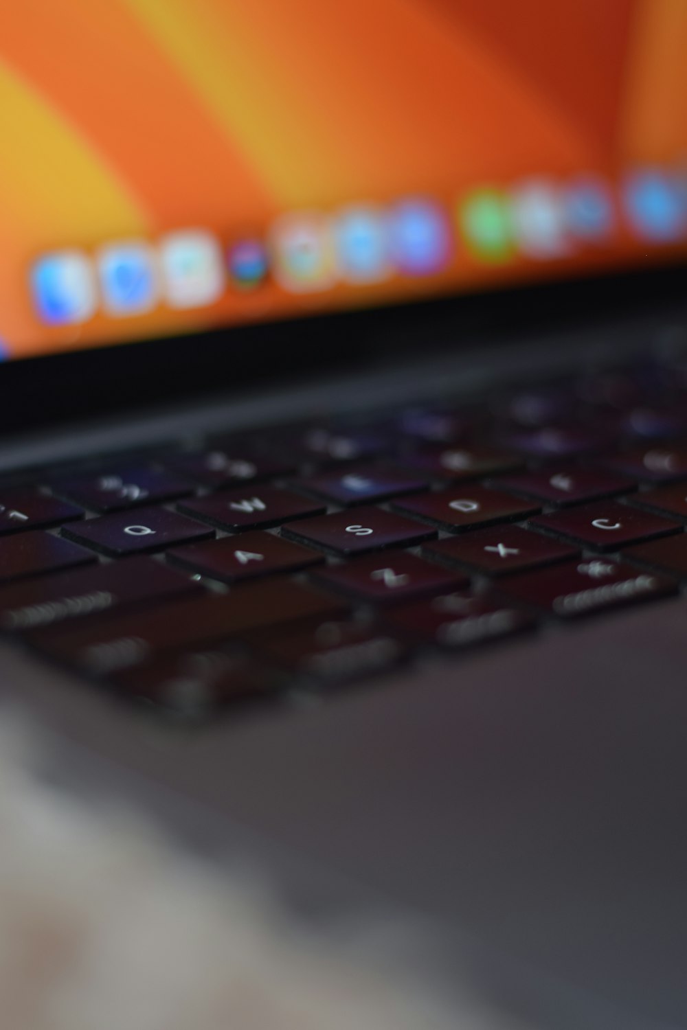 a close up of a laptop computer keyboard