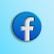 A glossy blue circular icon featuring a prominent white lowercase 'f' in the center, typically associated with a popular social media platform. The icon stands out against a gradient background that transitions from light blue to turquoise.