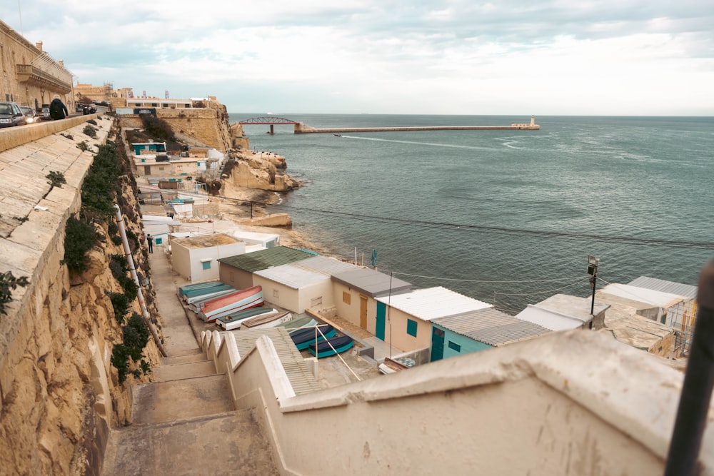 a view of the ocean from a balcony of a building