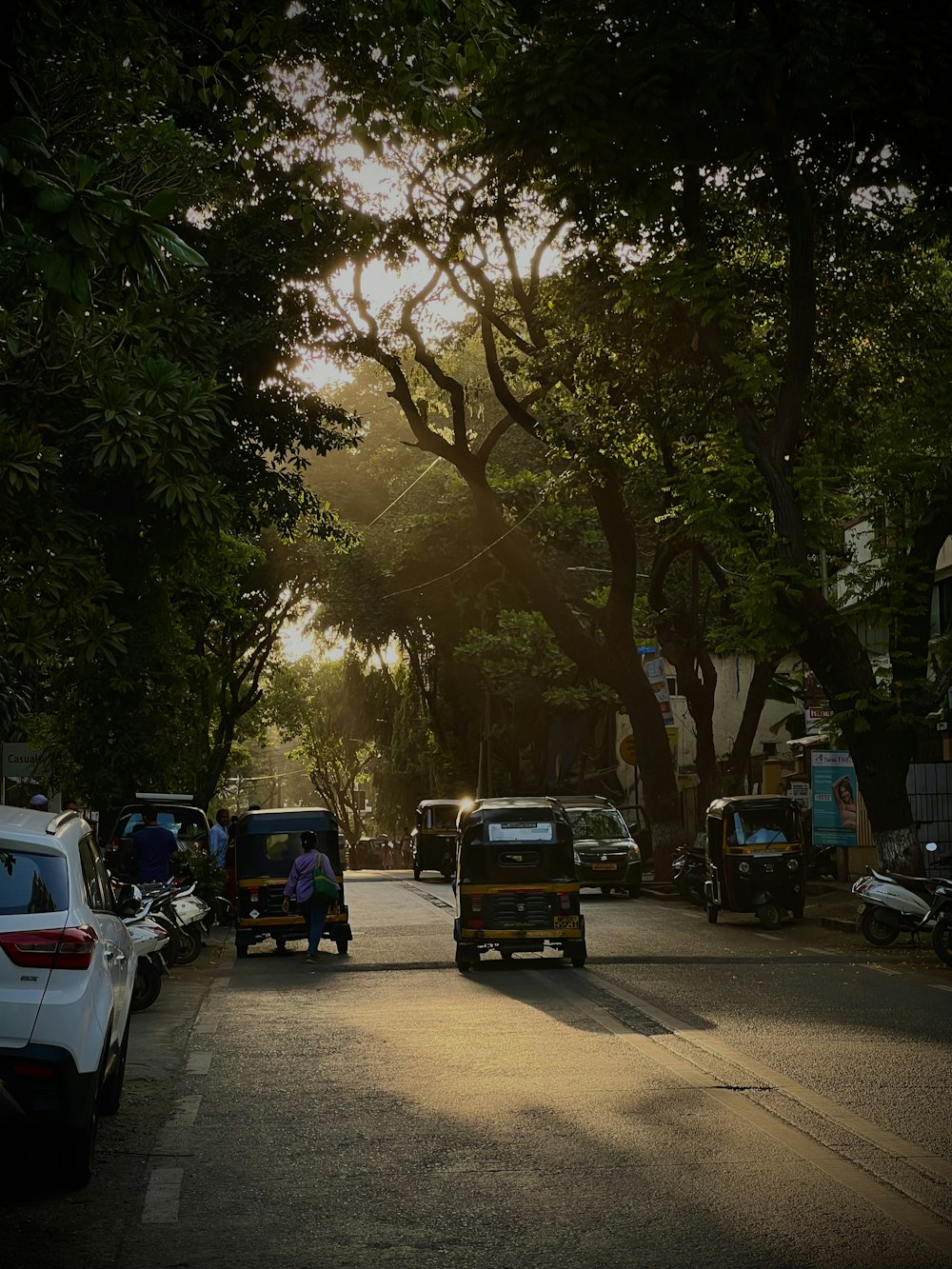 a group of cars parked on the side of a road