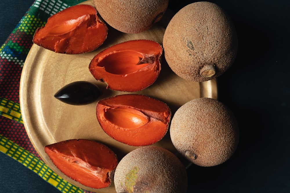 a close up of a plate of fruit on a table