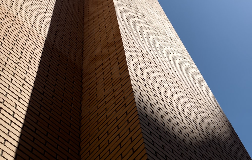 a tall building with a clock on the top of it