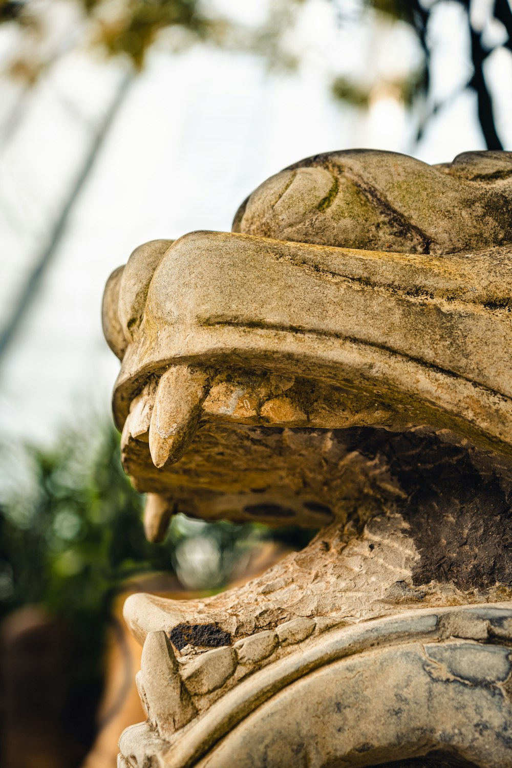 a close up of a statue of a person wearing a hat