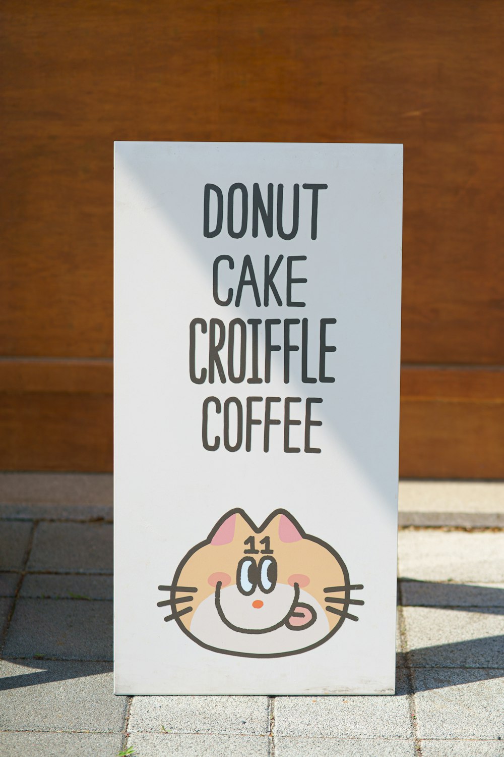 a sign that says donut cake croffle coffee