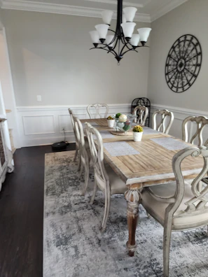 Dining room with handcrafted table and matching chairs highlighting craftsmanship.
