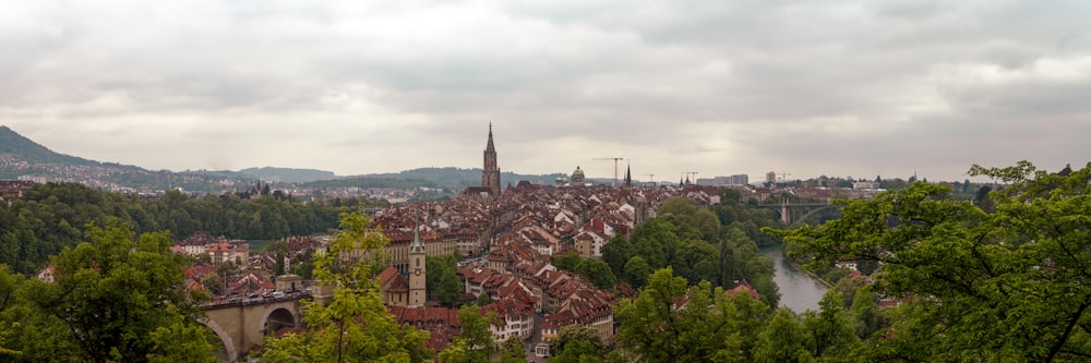 a view of a city with a bridge in the distance