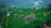 A lush, green landscape featuring rolling hills covered with dense tea plantations. Large boulders and narrow paths cut through the vibrant foliage. A distant river winds through the background, flanked by forested areas.