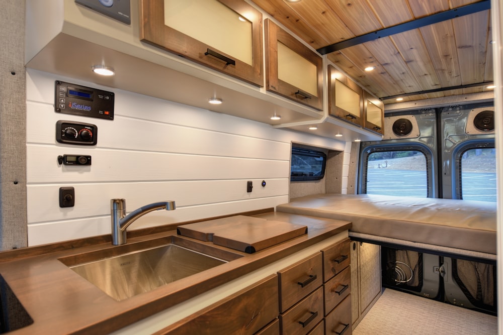 a kitchen with a sink and a window