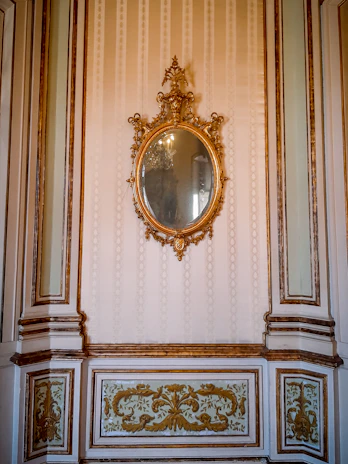 Decorative mirrors with intricate designs enhancing a luxury residential interior.