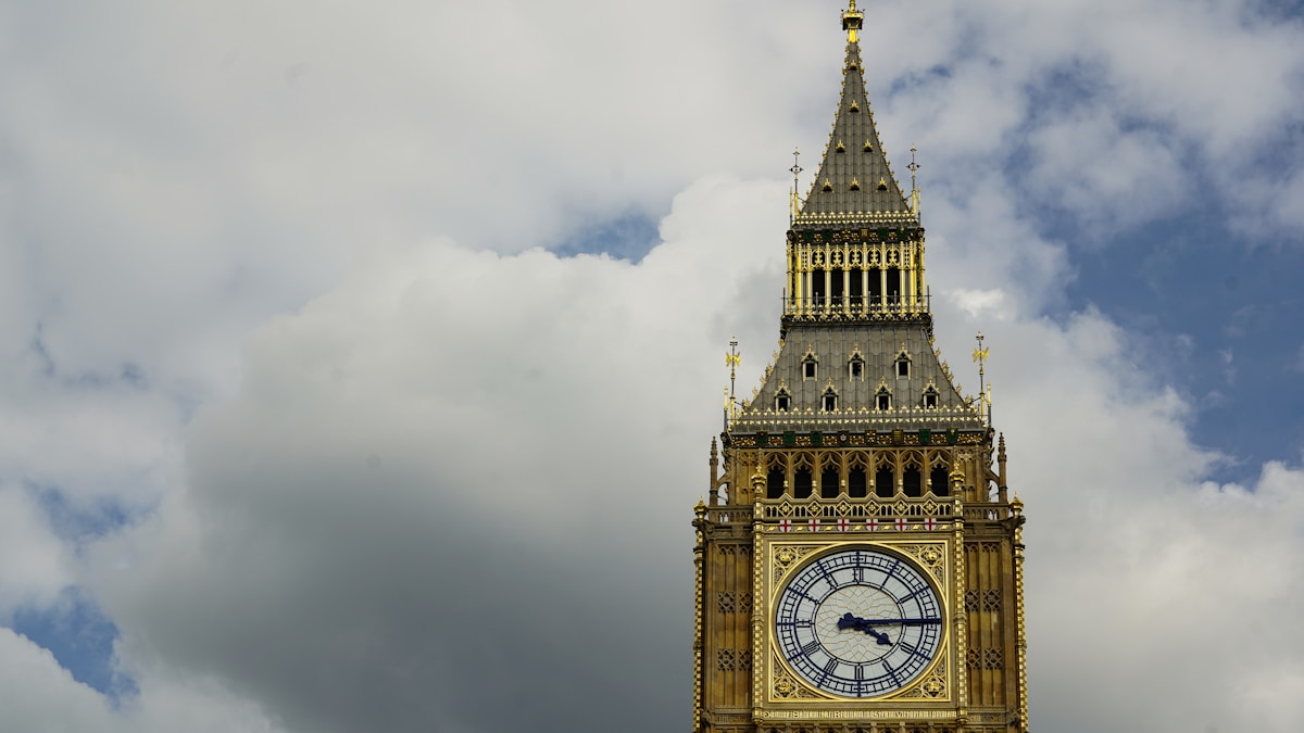 the big ben clock tower towering over the city of london