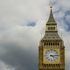 the big ben clock tower towering over the city of london