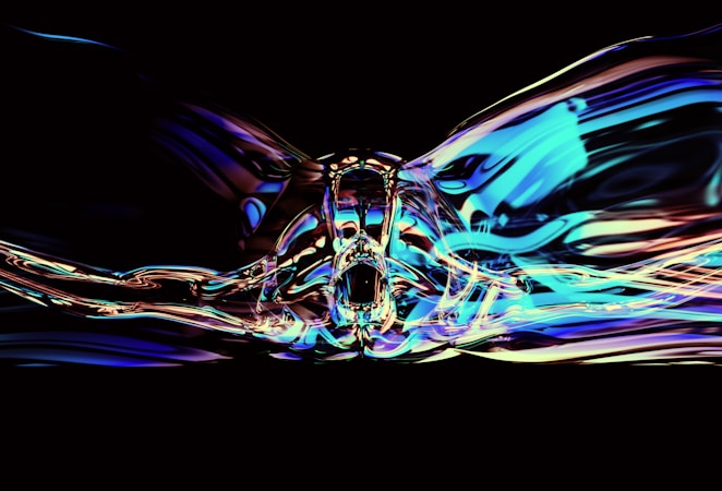 A symmetrical, abstract pattern with fluid, reflective surfaces that resemble glass or liquid metal. The design features swirling shapes with vibrant blue, purple, and gold hues against a dark background.