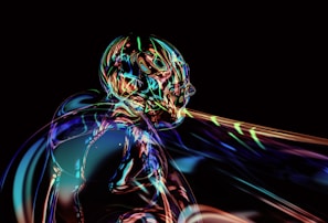A futuristic, abstract depiction of a humanoid figure rendered in vibrant, iridescent colors against a black background. The form is composed of swirling, liquid-like patterns, creating a dynamic and ethereal effect.