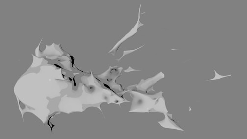 Soft gray abstract 3D forms layered against a stark white background, symbolizing thoughtful design layers.