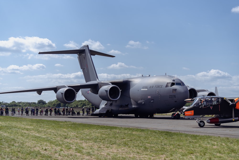 a large air plane sitting on top of an airport runway