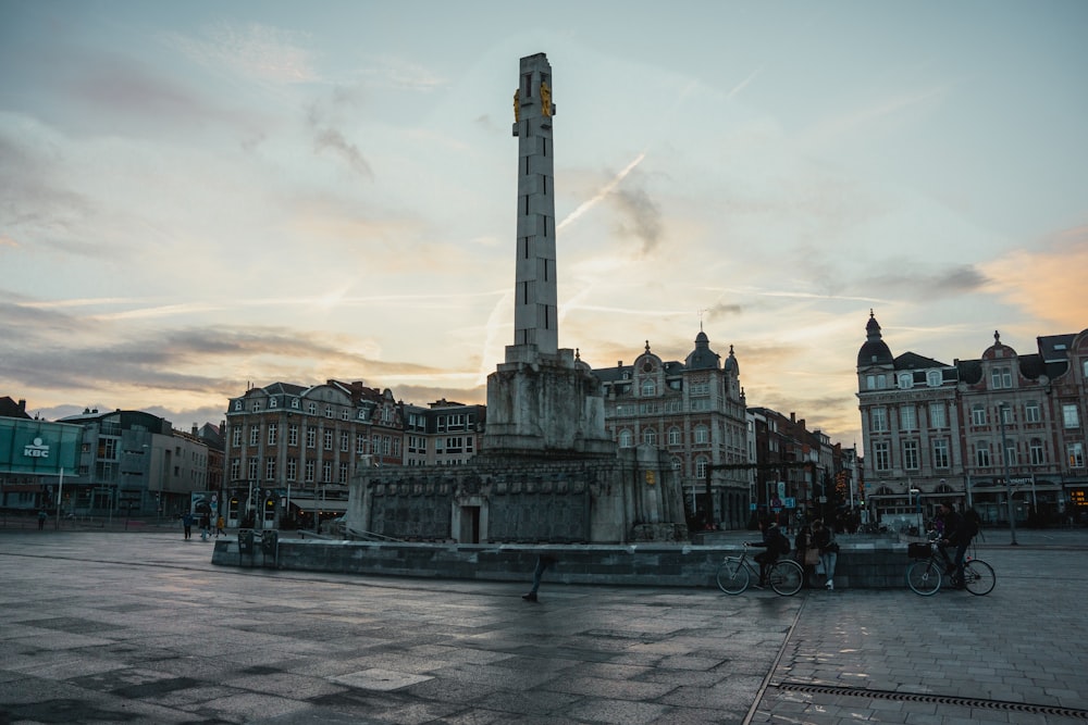 a large monument with a clock tower in the middle of it