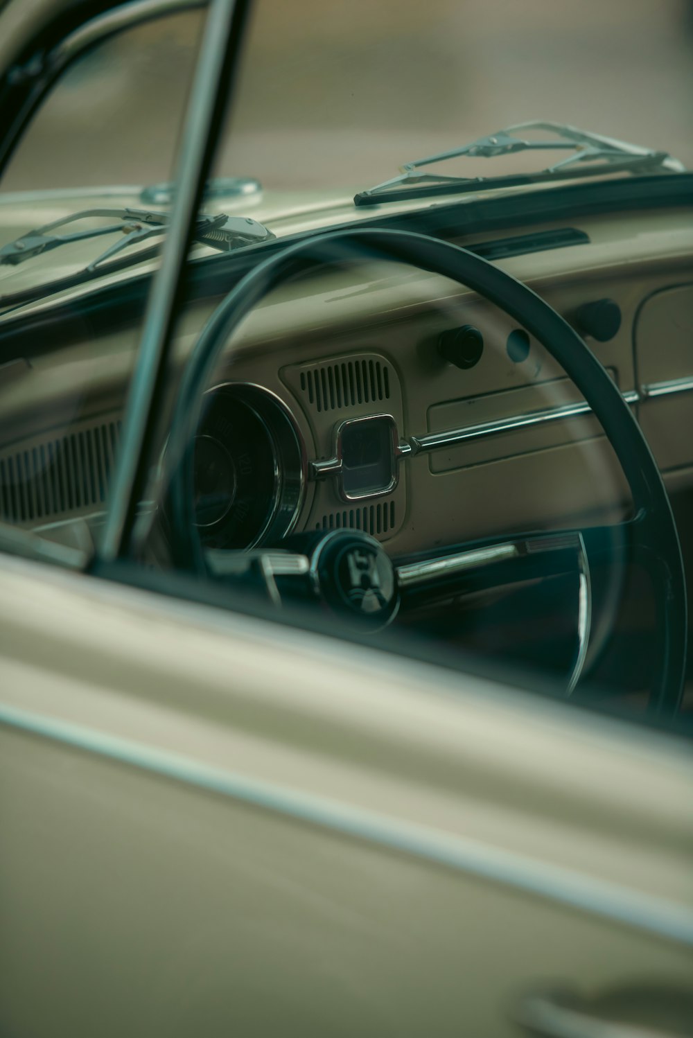 the interior of a car with a steering wheel