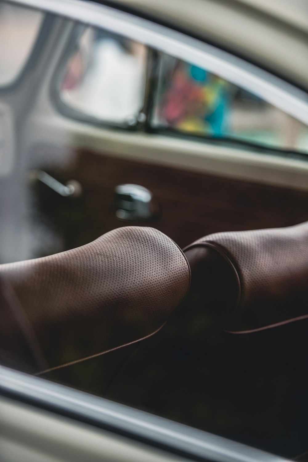 a close up of a car's steering wheel and dashboard