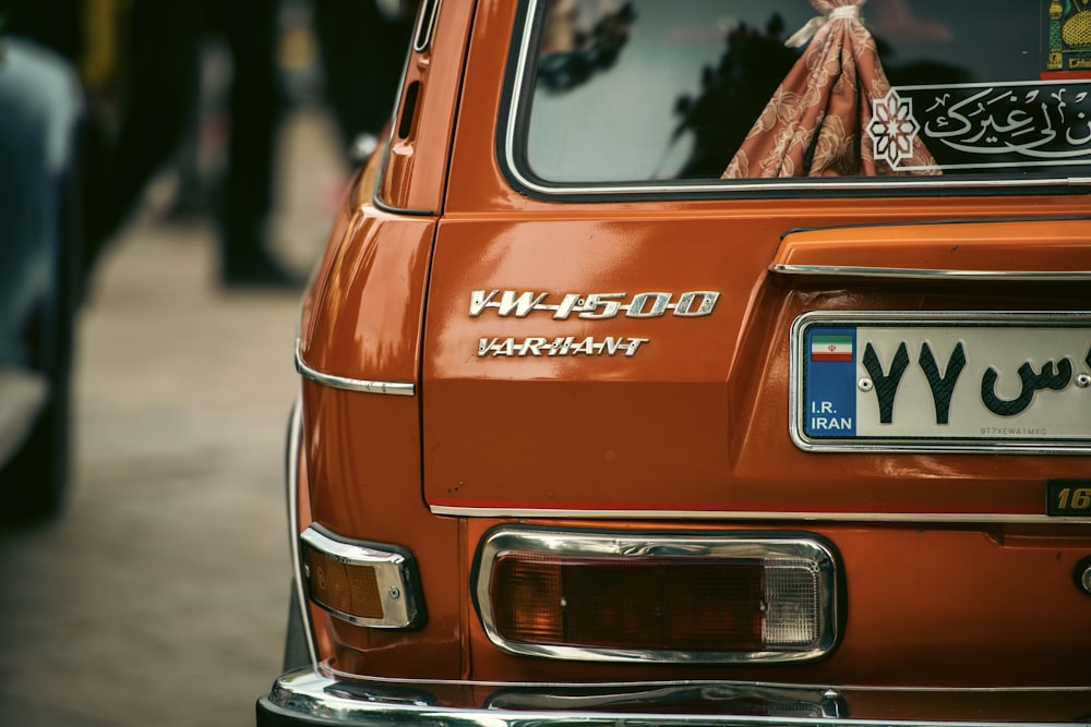 a close up of a car with arabic writing on it