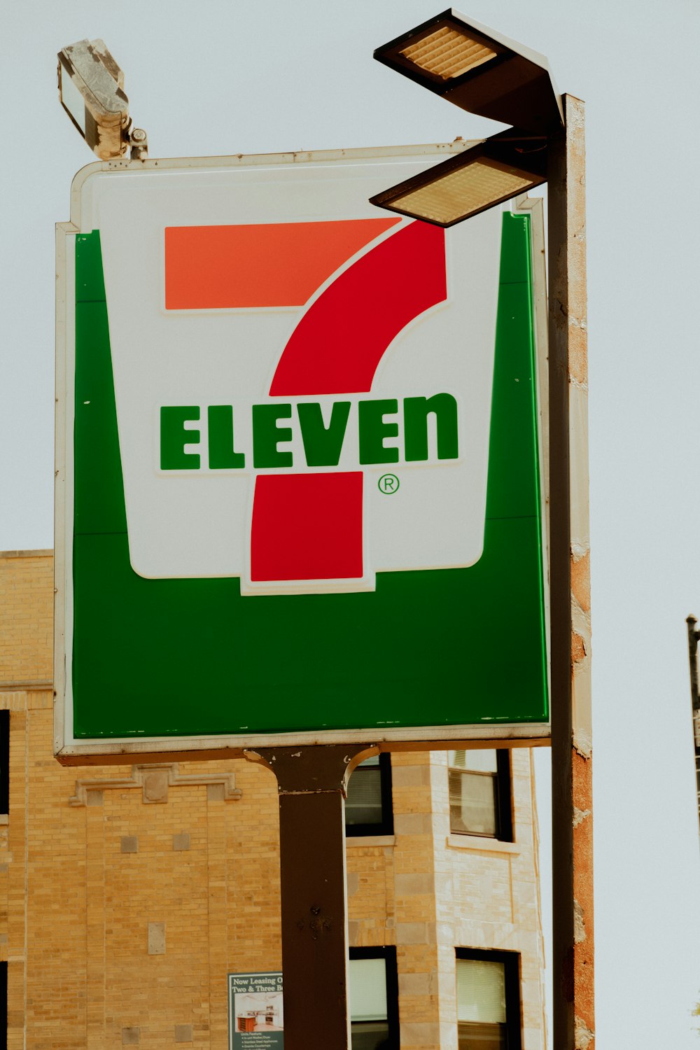 a seven seven sign in front of a building
