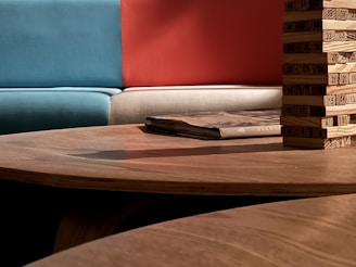 Colorful wooden puzzles and blocks arranged on a classroom table