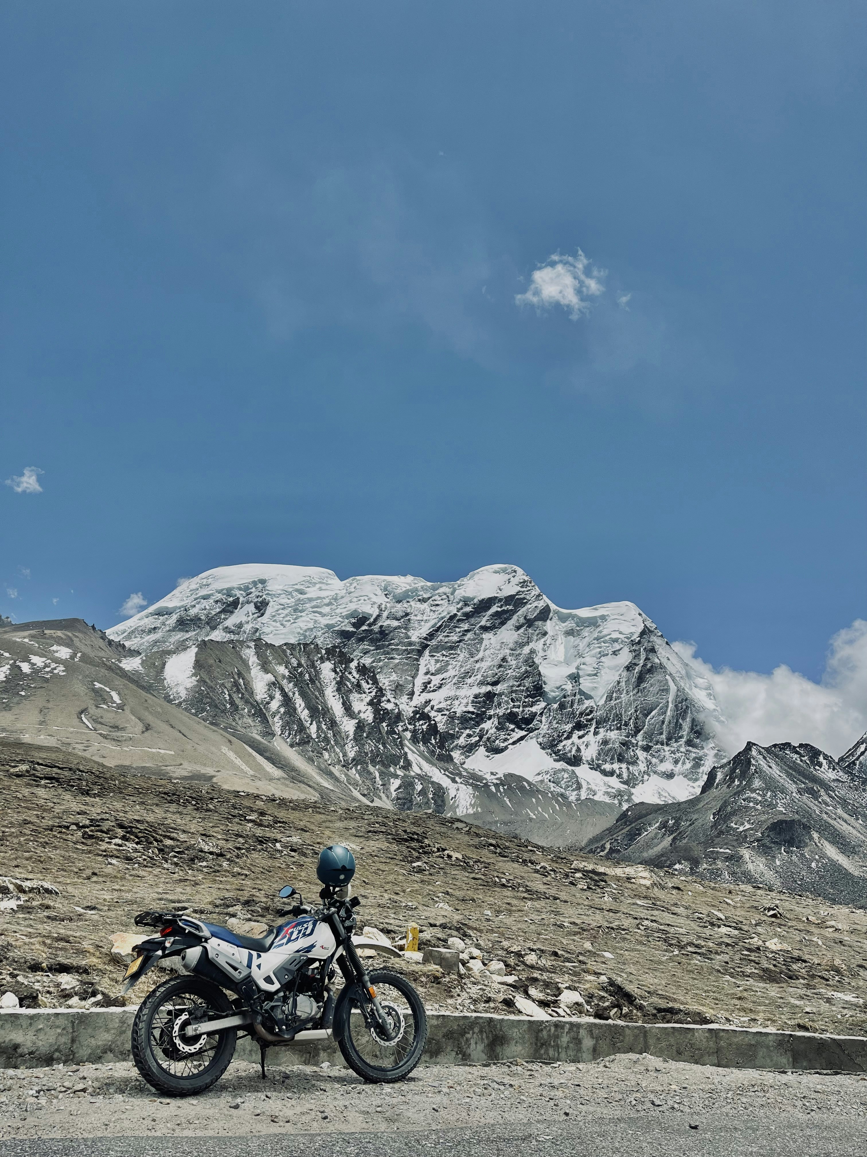 a motorcycle parked on the side of a road