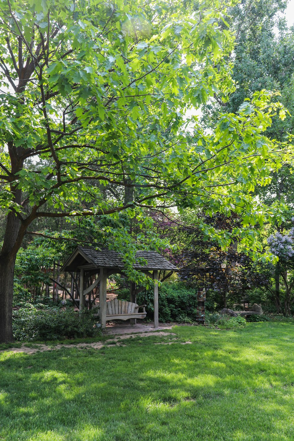 a gazebo in the middle of a grassy area