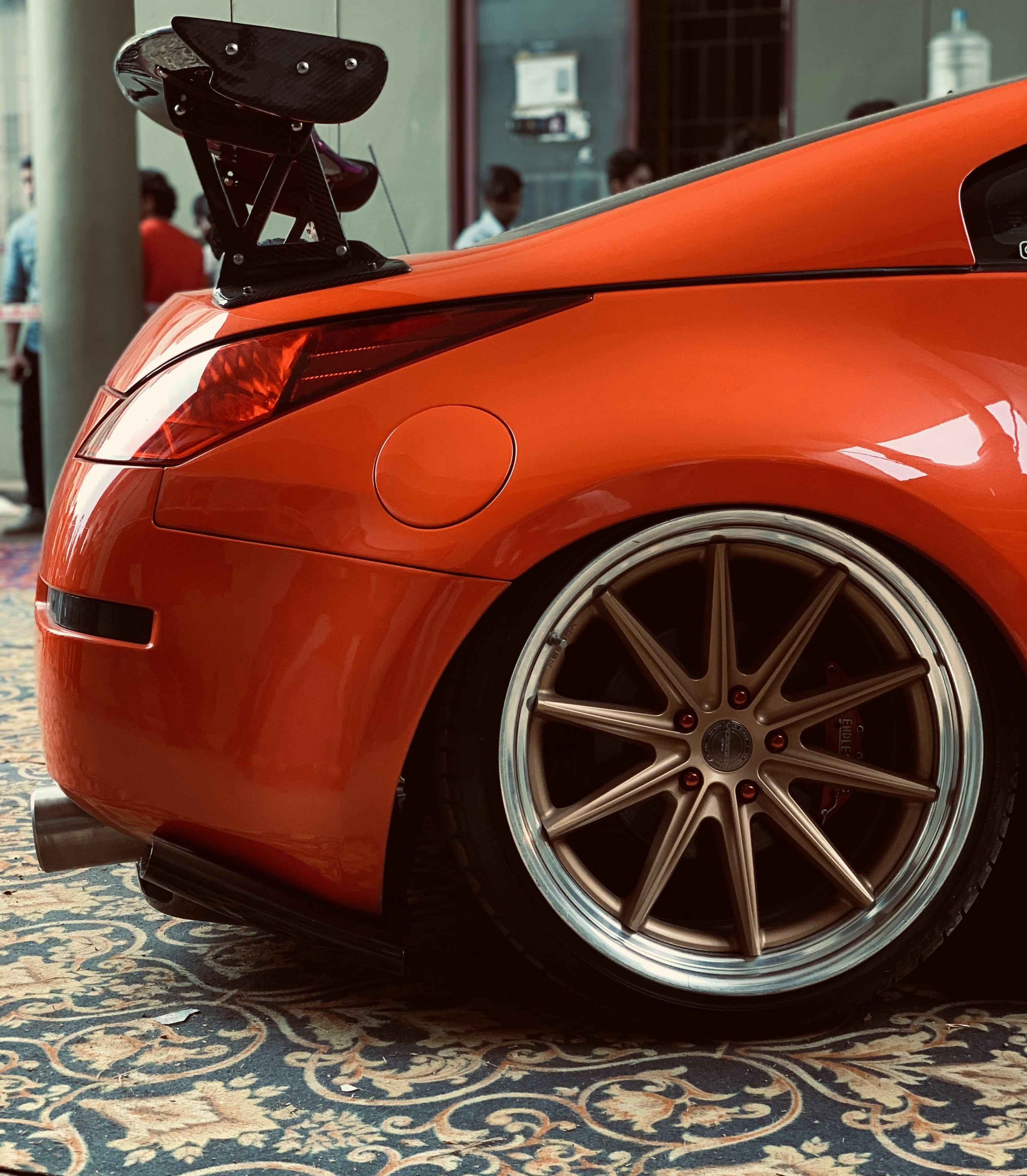 a close up of a sports car on a carpet