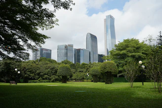A vibrant cityscape blending modern buildings with green spaces, symbolizing sustainable growth.