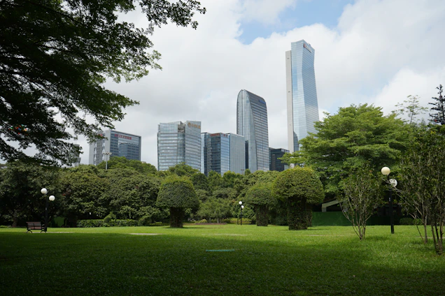 A vibrant cityscape blending modern buildings with green spaces, symbolizing sustainable growth.